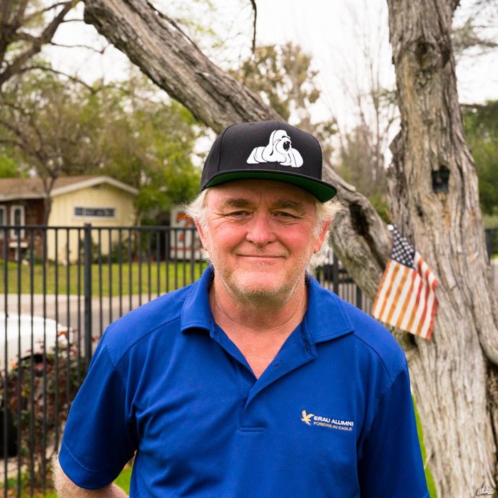 Customer wearing a black Nuwud logo hat outdoors
